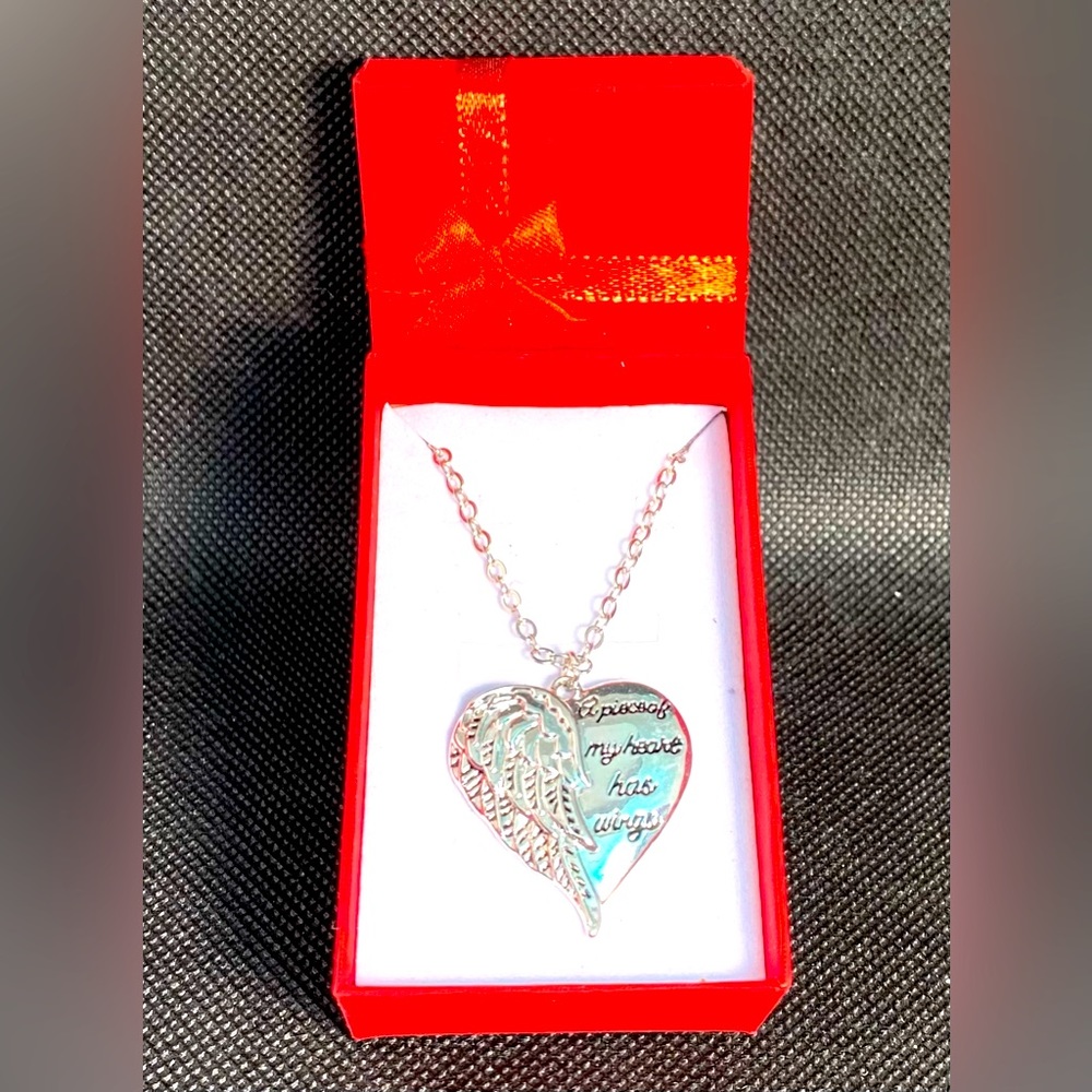 Silver heart necklace “A piece of my heart has wings” new in red gift box